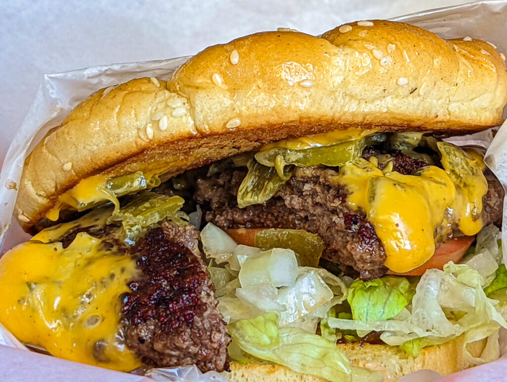 A green chile cheeseburger nearby Albuquerque, New Mexico. Getting a chile cheeseburger is a great thing to do in New Mexico